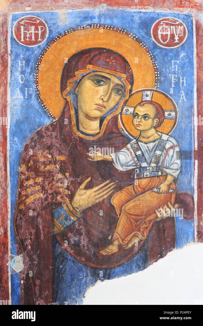 Una parete murale raffigurante Maria con Bambino al 11esimo secolo la chiesa di San Nicola del tetto (Agios Nikolaos Tis Stegis) in Kakopetria, Cipro Foto Stock