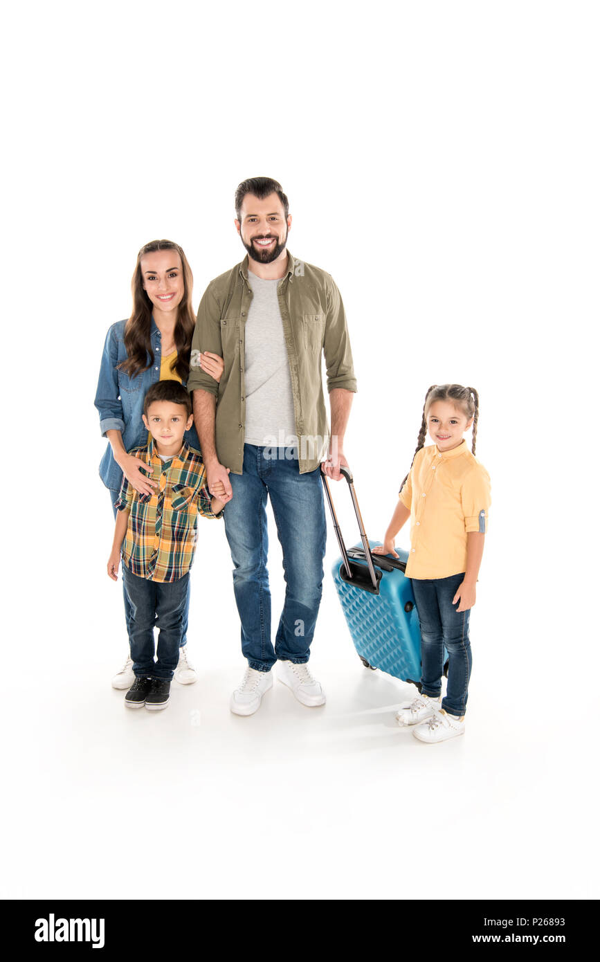 La famiglia felice con la valigia pronto per il viaggio, isolato su bianco Foto Stock