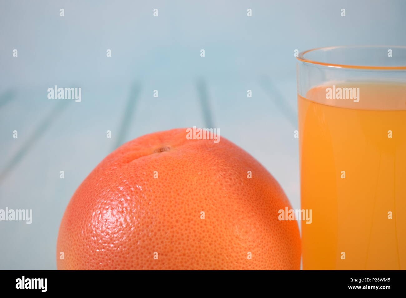 Succo di frutta e frutta di arancia Foto Stock