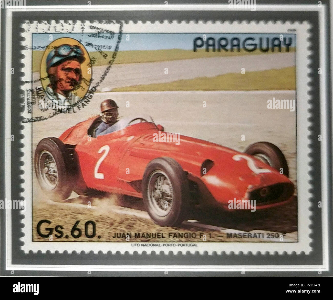 28 Juan Manuel Fangio F1 - Maserati 250 F - Paraguauy timbro Foto Stock