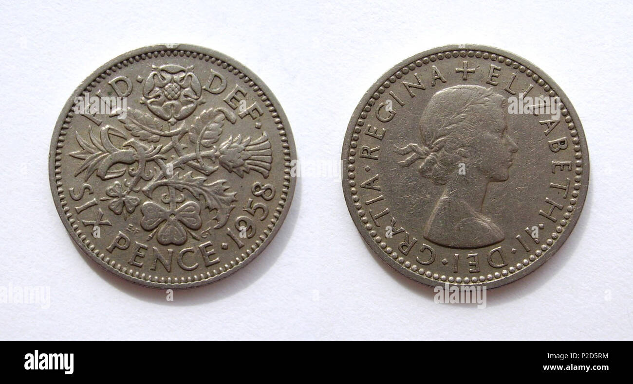 . Elizabeth II Sixpence dal 1958. Diametro: 3/4". Entrambi i lati sono della stessa medaglia. L'epigrafe recita "Elizabeth II DEI GRATIA REGINA', che traduce dal latino come "Elizabeth II, con la grazia di Dio, Regina", e poi su altro lato 'FID DEF' significa 'Defender della fede". Il 19 luglio 2009. Anakin101 18 Inglese Sixpence 1958 Foto Stock
