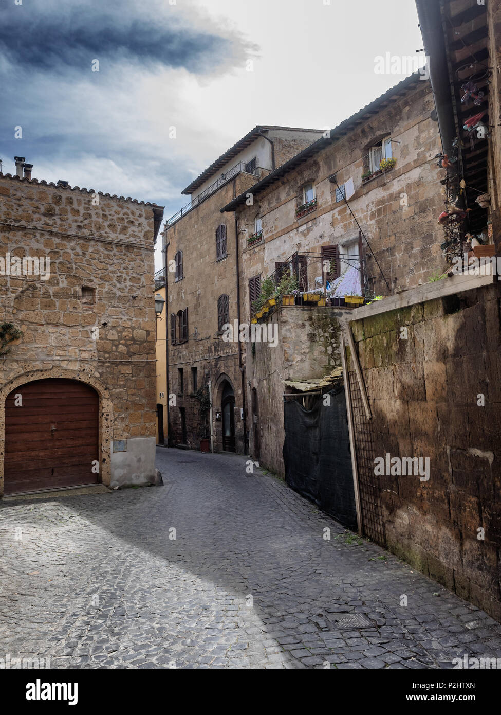 Strette stradine della vecchia città etrusca di Orvieto in Umbria, Italia Foto Stock