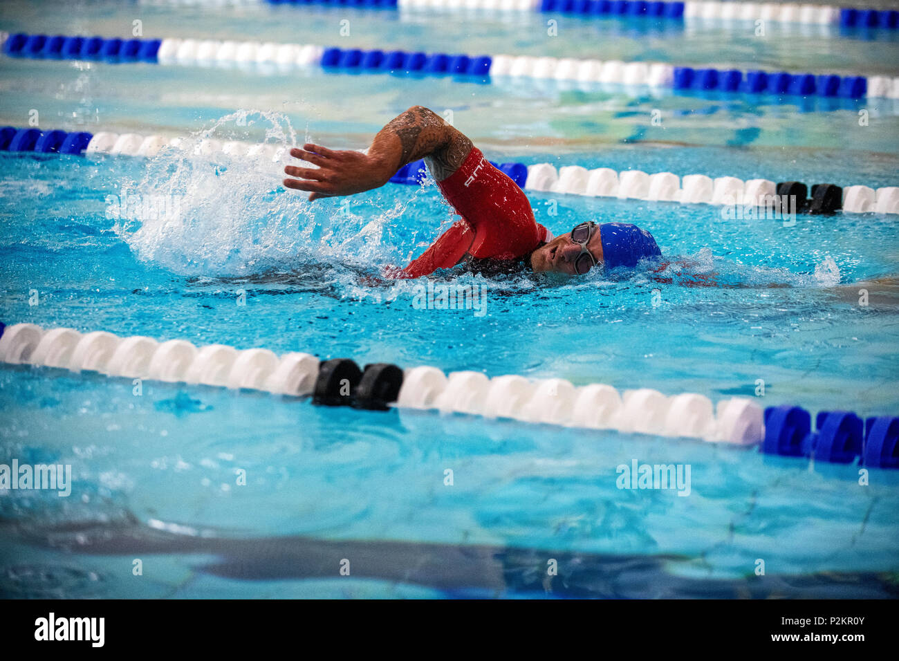 Ex Royal Marine Commando Joe Townsend che ha vinto il Commonwealth oro in uomini della para-triathlon. Foto Stock