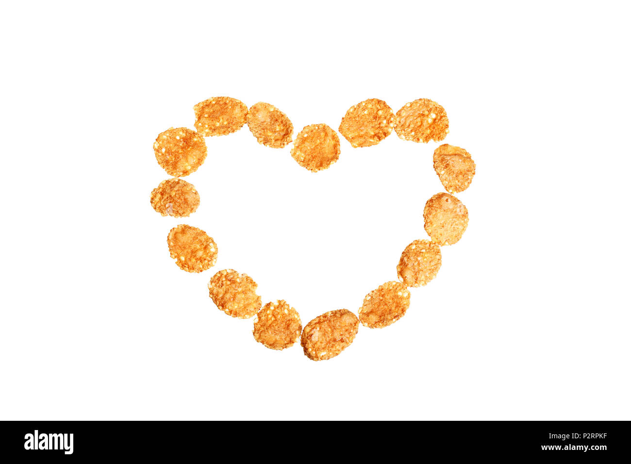 Immagine della forma di cuore fatta di fiocchi di mais contro uno sfondo bianco Foto Stock