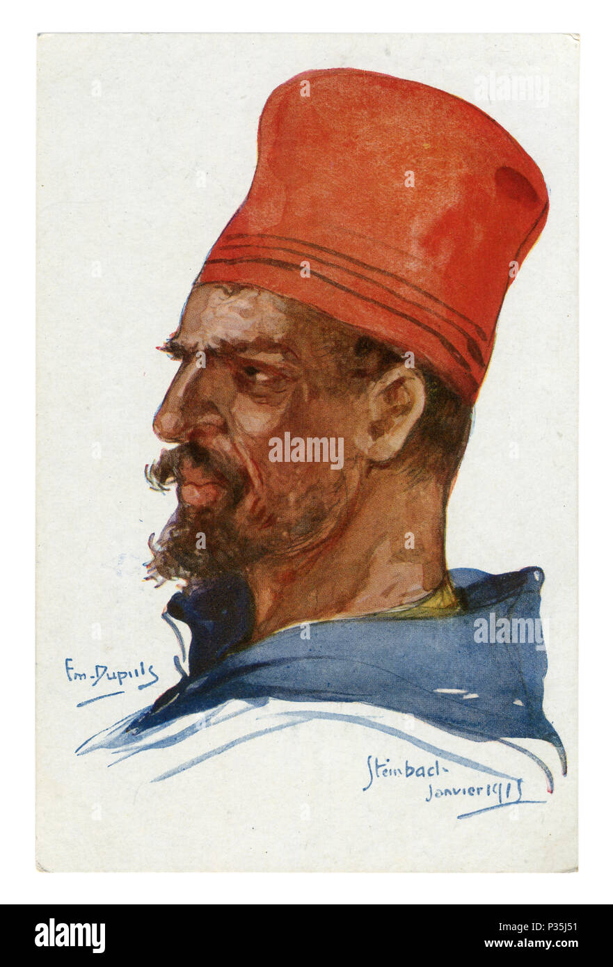 Storico francese cartolina: ritratto di un soldato delle truppe coloniali in un alto cappuccio rosso con barba e baffi. la prima guerra mondiale (1914-1918). Francia Foto Stock