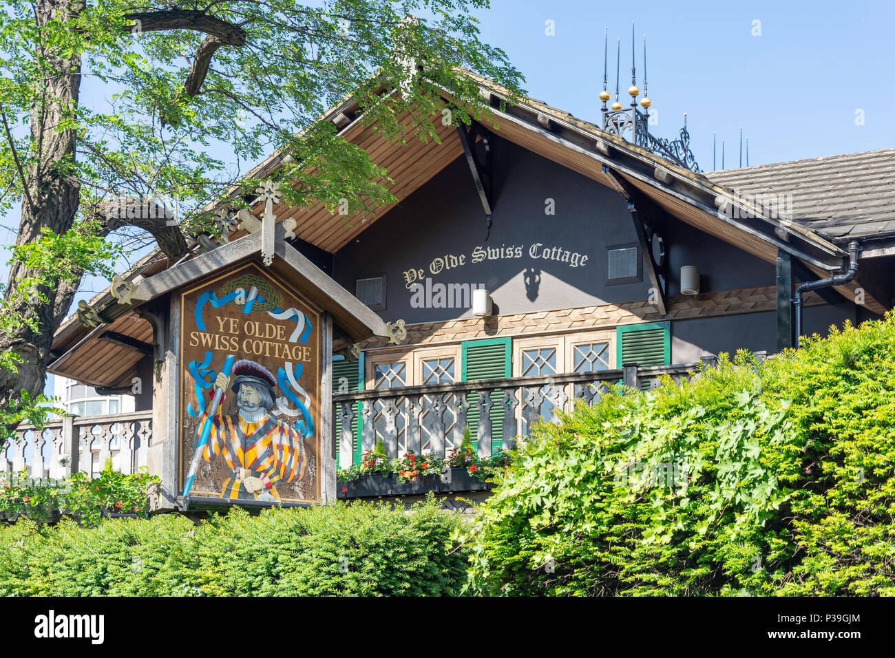Pub segno a Ye Olde Swiss Cottage, Finchley Road, Swiss Cottage, Hampstead, London Borough of Camden, Greater London, England, Regno Unito Foto Stock