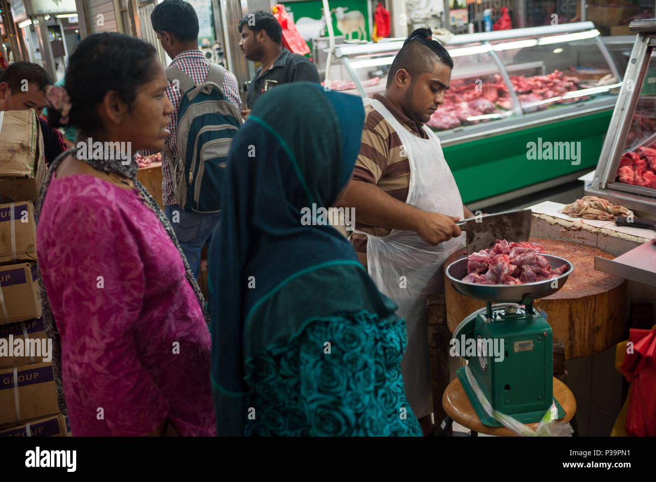 Singapore Repubblica di Singapore, macellaio nel mercato Tekka in Little India Foto Stock