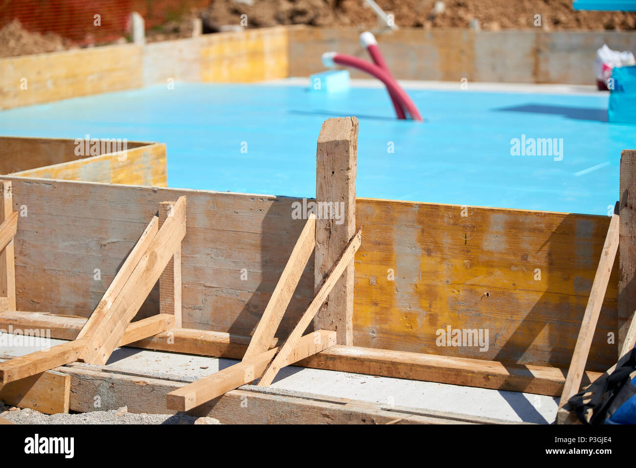 Piano di isolamento termico - materiale isolante per la costruzione dell'edificio. Riscaldamento a pavimento isolamento, warm house, eco friendly isolamento. Foto Stock