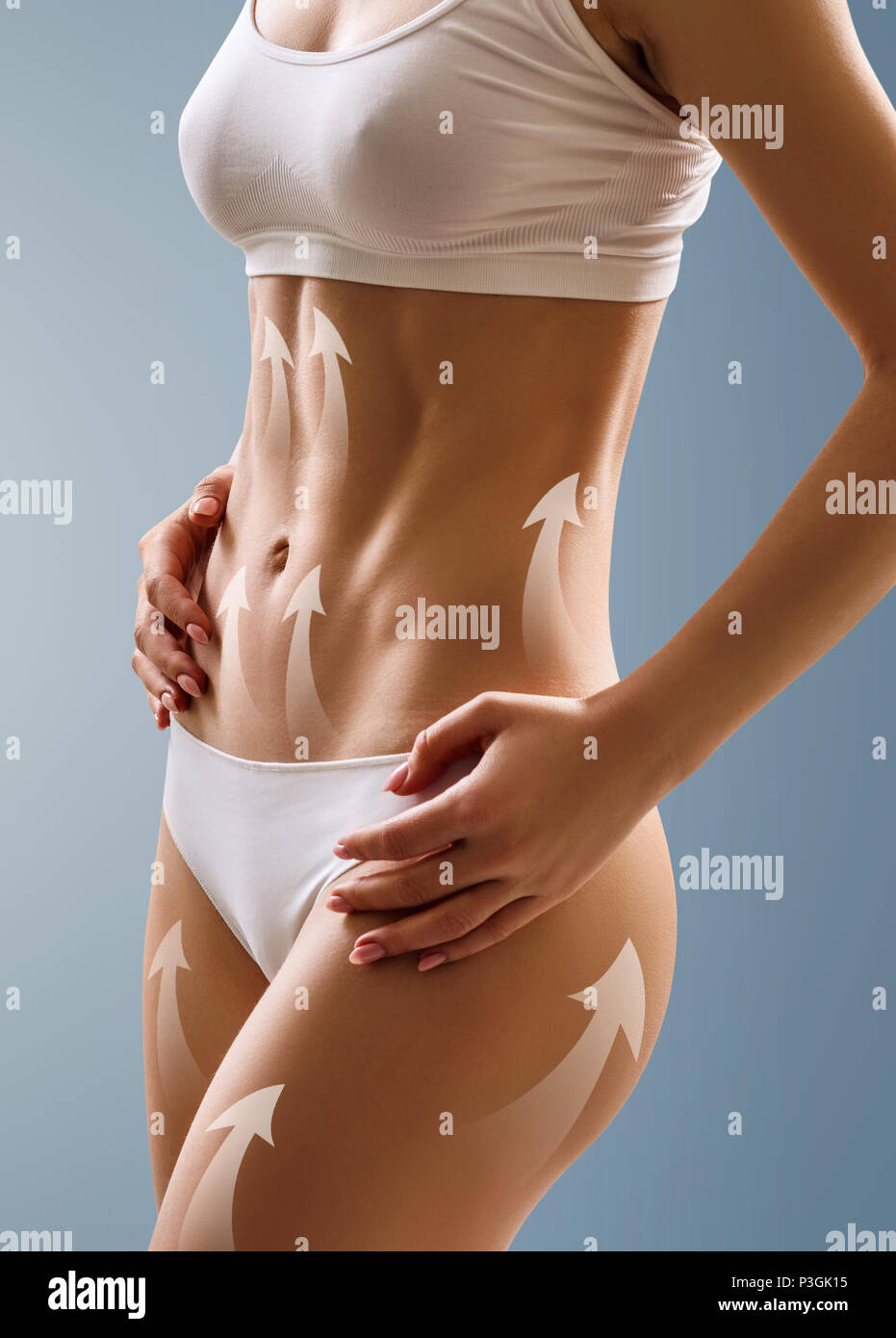 Sottile corpo di donna con le frecce mostra effetto lifting. Foto Stock