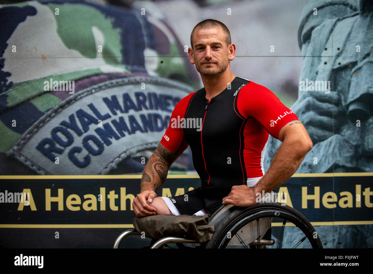 Ex Royal Marine Commando Joe Townsend che ha vinto il Commonwealth oro in uomini della para-triathlon. Foto Stock