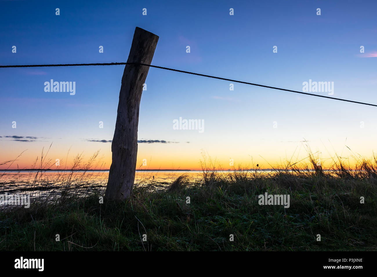 Alba sulla costa del Mare del Nord dell'isola Amrum, Germania. Foto Stock