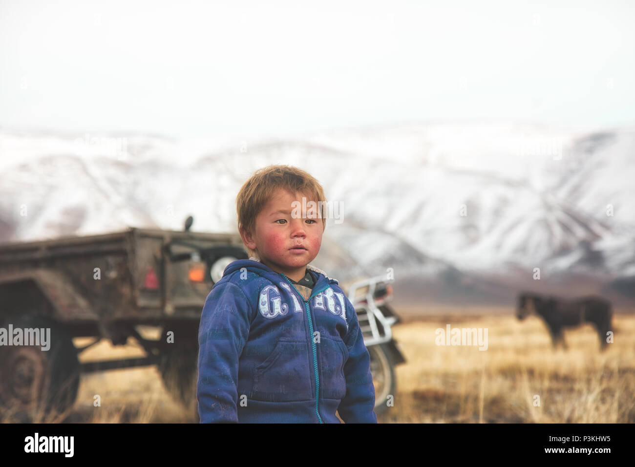 Il mongolo kid paesaggio rurale Foto Stock