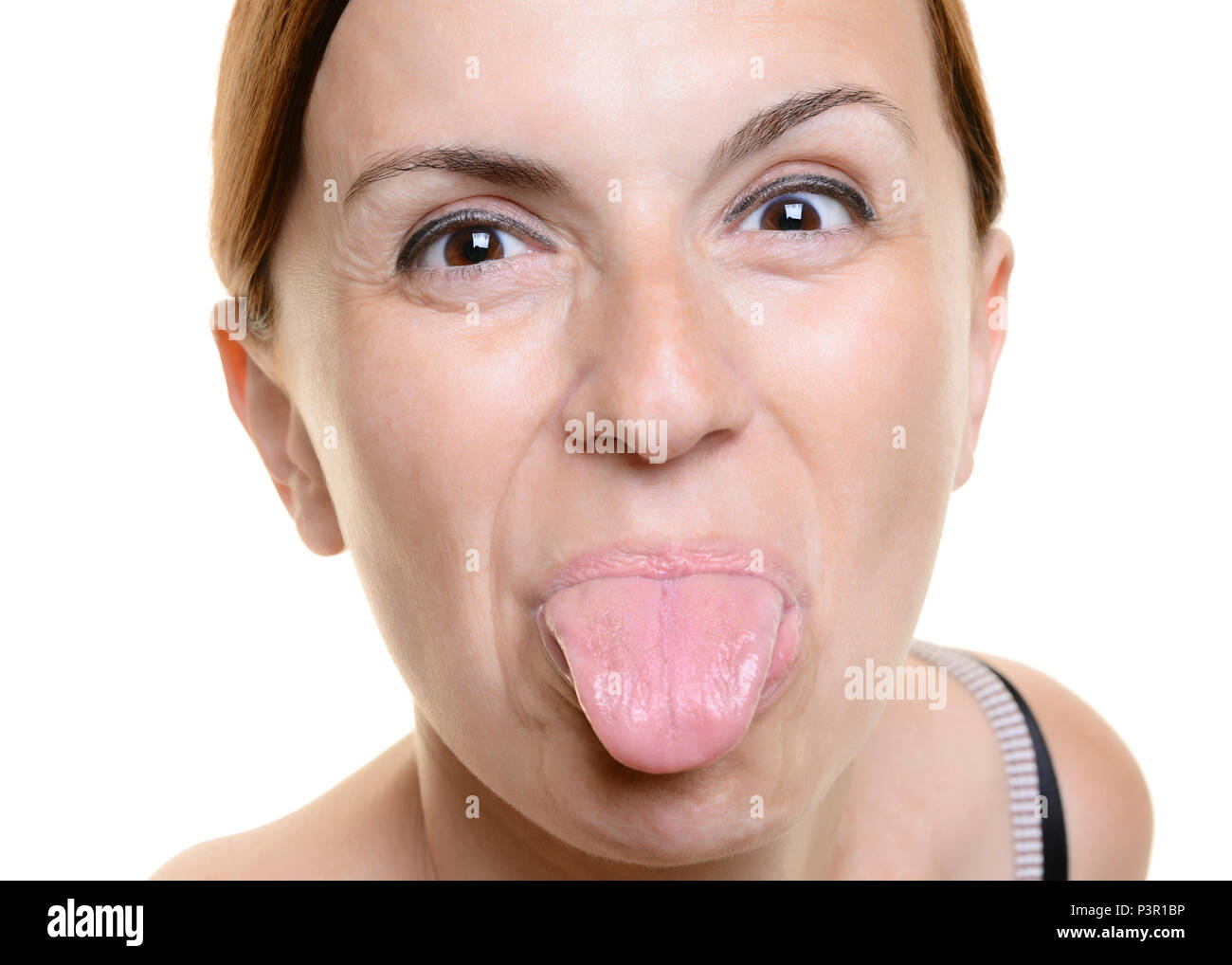 La donna il suo incollaggio con la lingua fuori Foto Stock