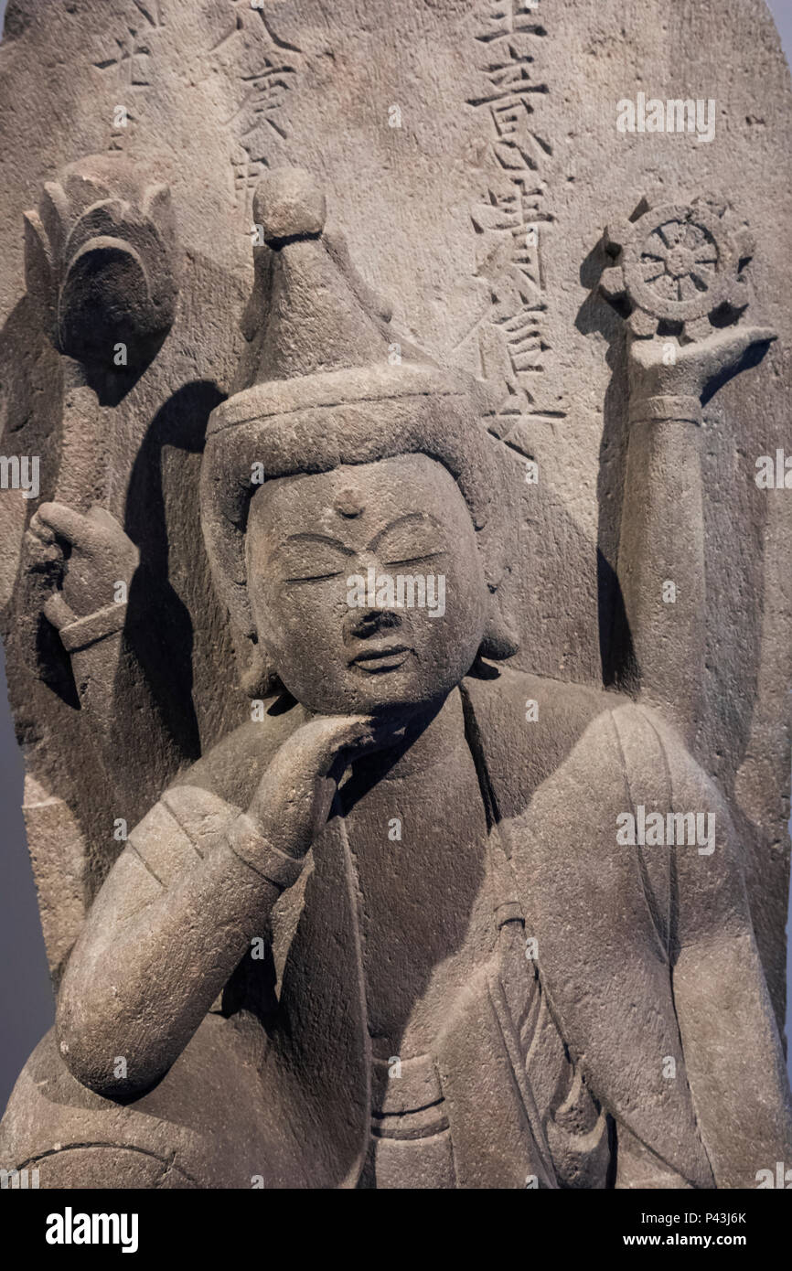 La scultura in pietra di Kannon Nyoirin datata 1680 Foto Stock