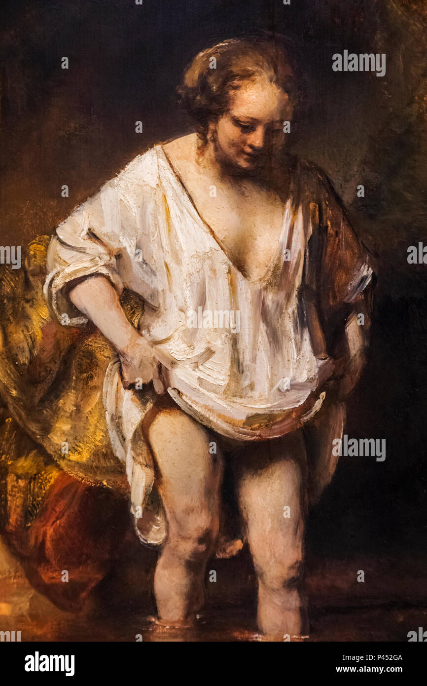 La verniciatura di una donna che faceva il bagno in un flusso di Rembrandt datata 1654 Foto Stock