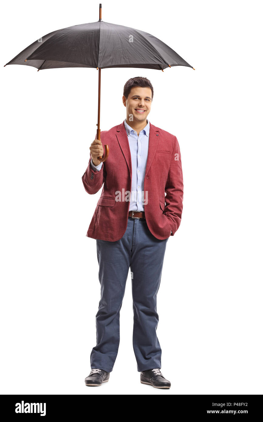 A piena lunghezza Ritratto di un ambiente elegantemente vestito uomo con un ombrello isolati su sfondo bianco Foto Stock