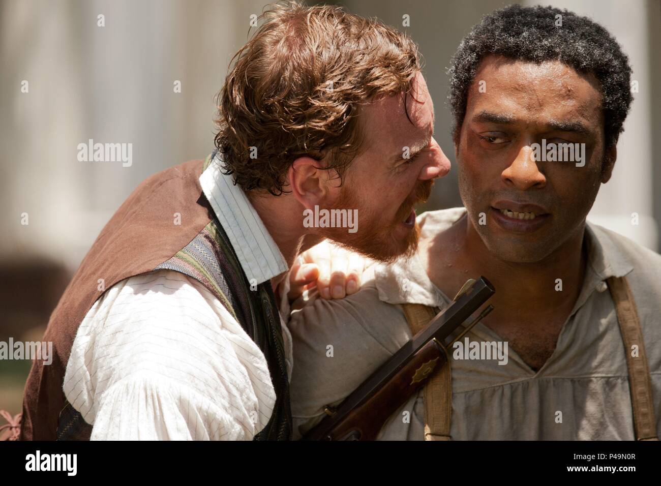 Pellicola originale titolo: 12 anni uno slave. Titolo inglese: 12 anni uno slave. Regista: Steven R. MCQUEEN. Anno: 2013. Stelle: Chiwetel Ejiofor; Michael Fassbender. Credito: REGENCY IMPRESE / Album Foto Stock