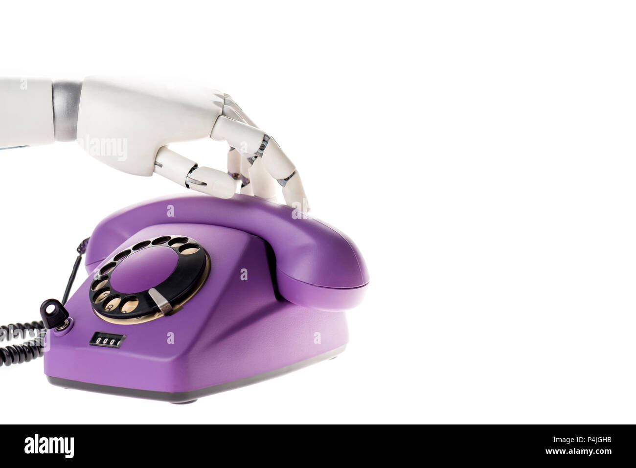 Mano di robot di toccare i raggi ultra violetti retrò telefono fisso isolato su bianco Foto Stock