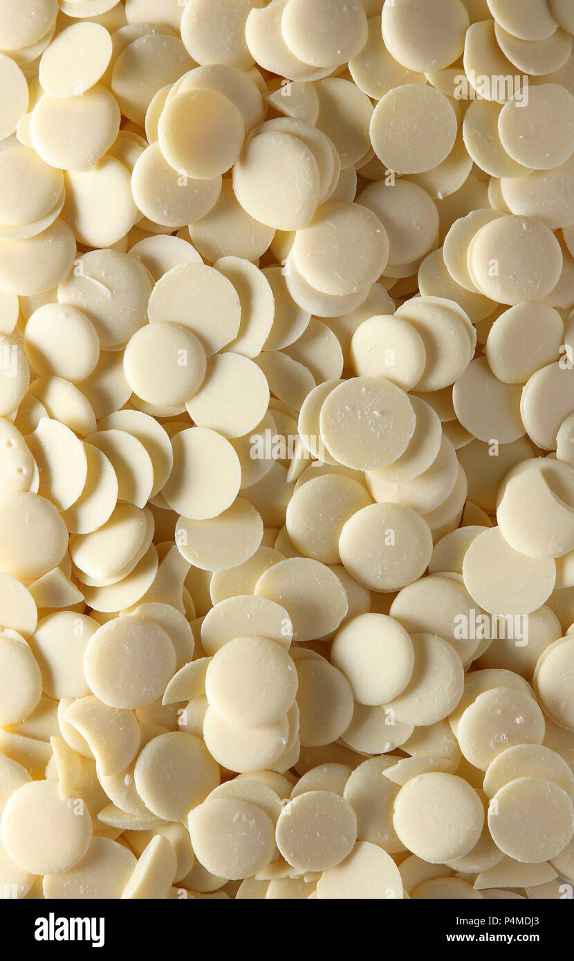 Il cioccolato bianco gocce (full frame) Foto Stock