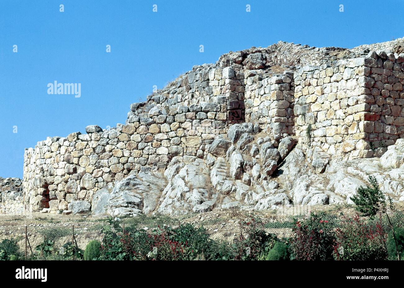 Arte micenea La Grecia. Tirinto. Città micenea il cui insediamento cominciò nel periodo Proto-Helladic, durante il terzo millennio A.C. Tra il 1400 e il 1200 A.C. mura furono erette. Foto Stock