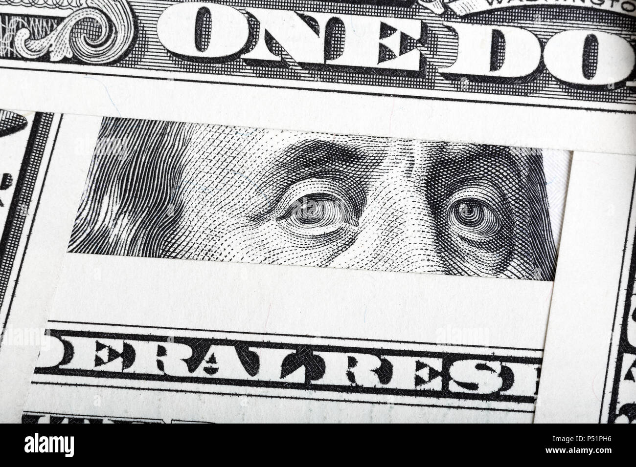 Close-up di un centinaio di bill Franklin ritratto incorniciato da altri b Foto Stock