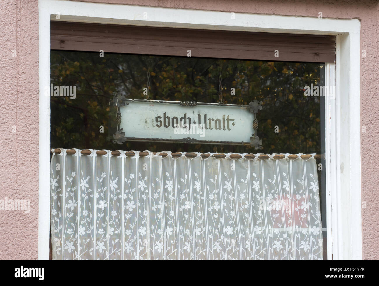 Berlin angolo bar con la pubblicità per Asbach-Uralt Foto Stock