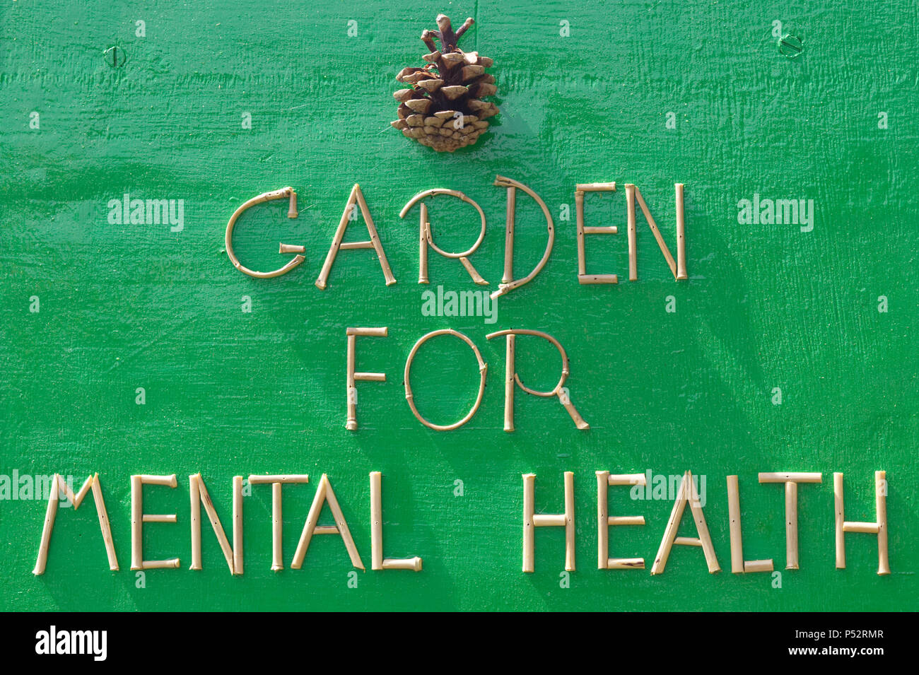 Giardino per la salute mentale di bambù e un segno del cono Foto Stock