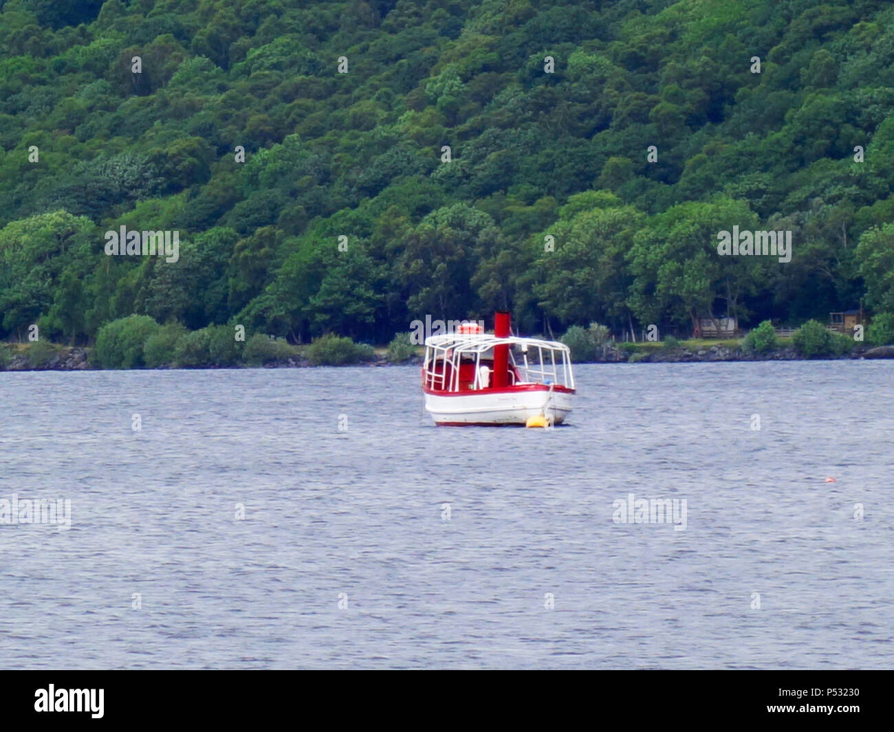 Barche nutrite a Conwy e Barmouth nel Galles del Nord, alcuni spiaggiata Foto Stock