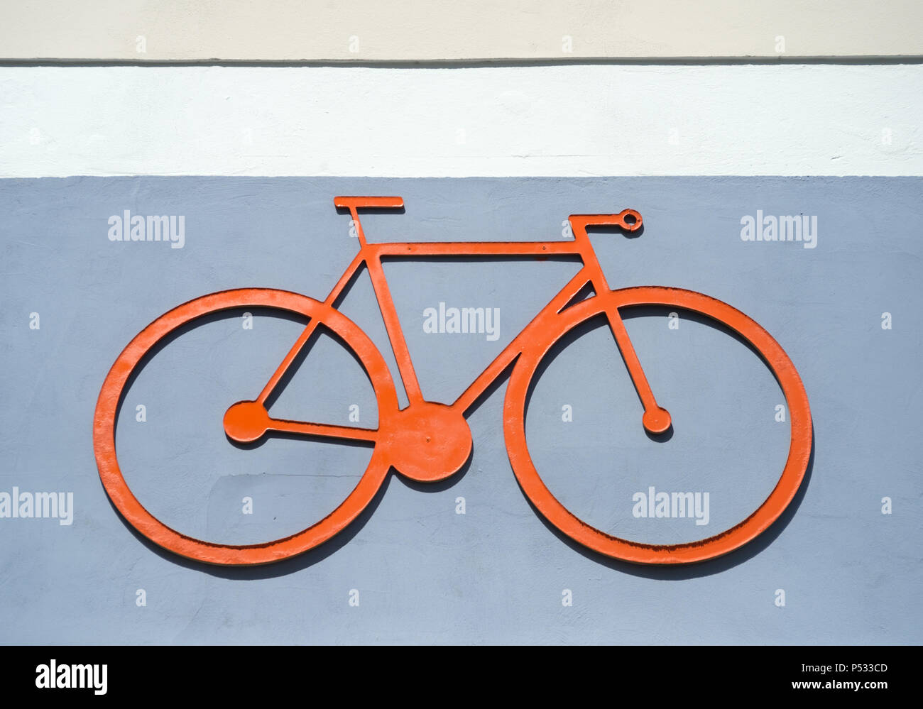 Il pittogramma di una bicicletta su un muro di casa Foto Stock