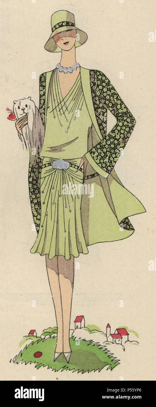 Moda donna in verde pallido pomeriggio ensemble in stampato crêpe de Chine. Indossa una perla girocollo e matching hat, porta un cane sotto il suo braccio.. Pochoir Handcolored (stencil) litografia dal lusso francese rivista di moda "Arte, gotta, BEAUTE' 1930. Foto Stock