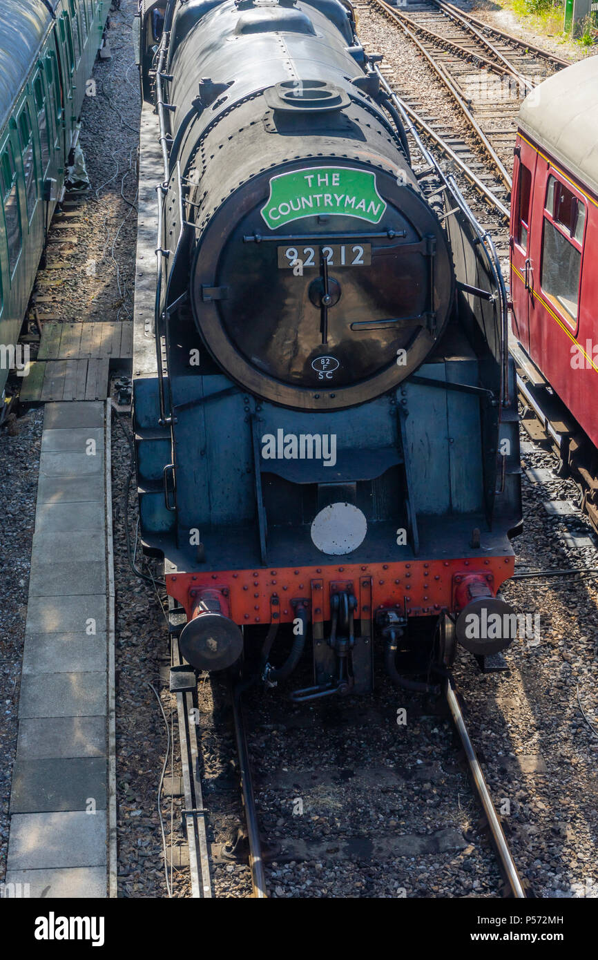 Conserve di BR Standard di Classe 9F locomotore 92212 attualmente in uso da parte di Metà Hants Railway qui raffigurato nella Arlesford in Hampshire 2018, Inghilterra, Regno Unito Foto Stock