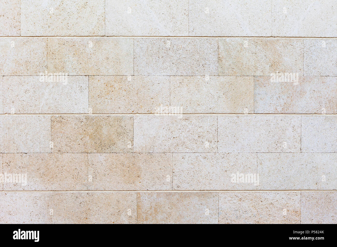 Texture di pietra bianca. Accurate di muratura in pietra arenaria bianca. Un muro di mattoni. Foto Stock