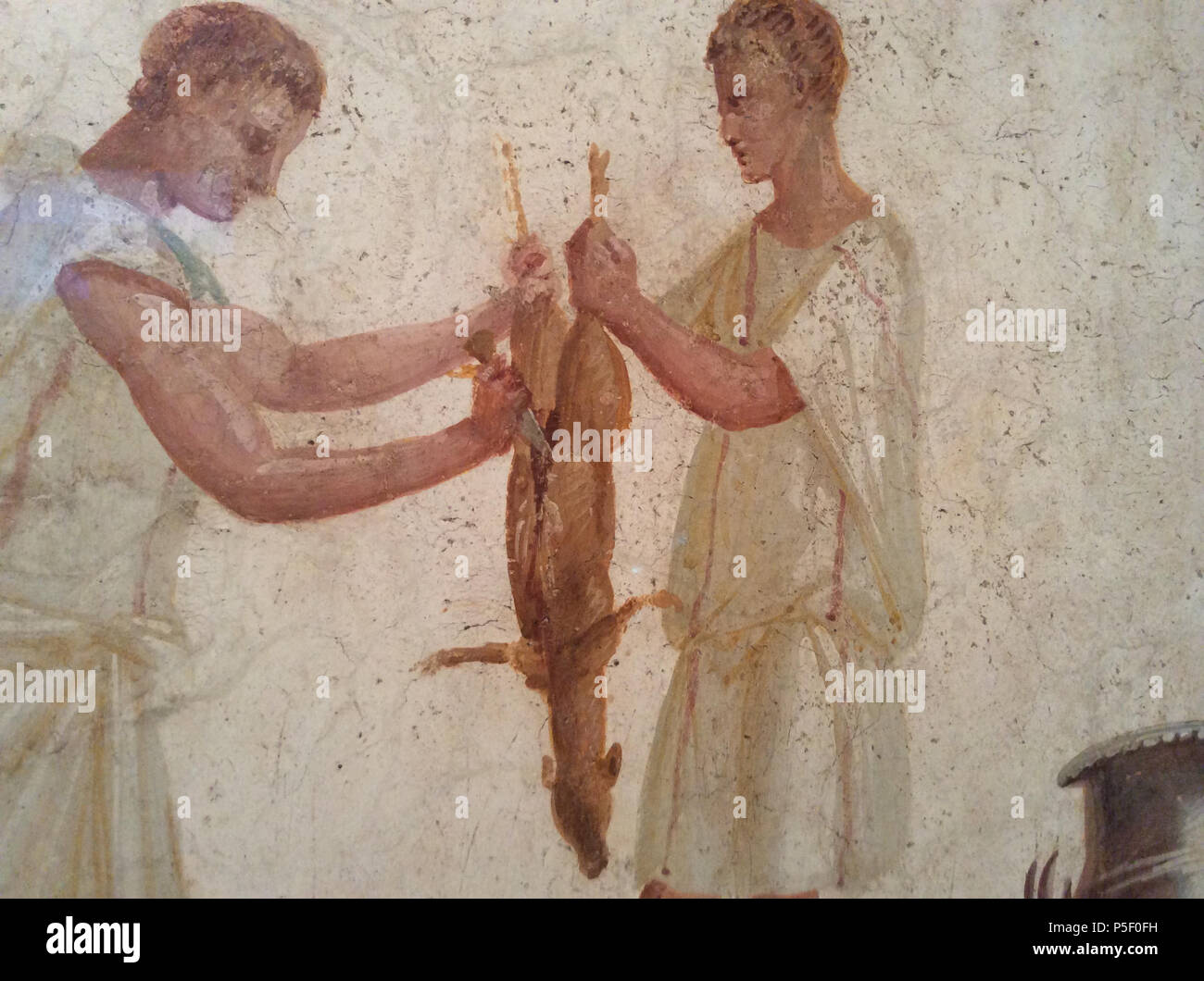 N/A. Dettaglio del muro romano la pittura di cuochi preparare un capretto . originale del I secolo d.c. Sconosciuto 377 Cookery pittura dettaglio 2 Foto Stock