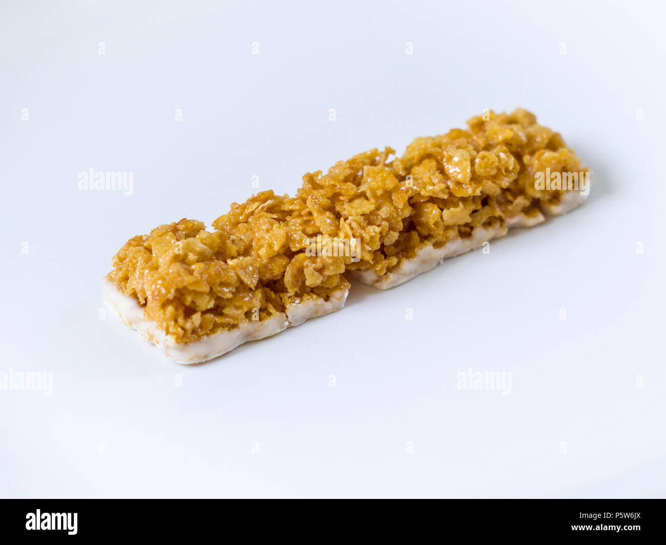 Frosties barrette di cereali sulla piastra bianca Foto Stock
