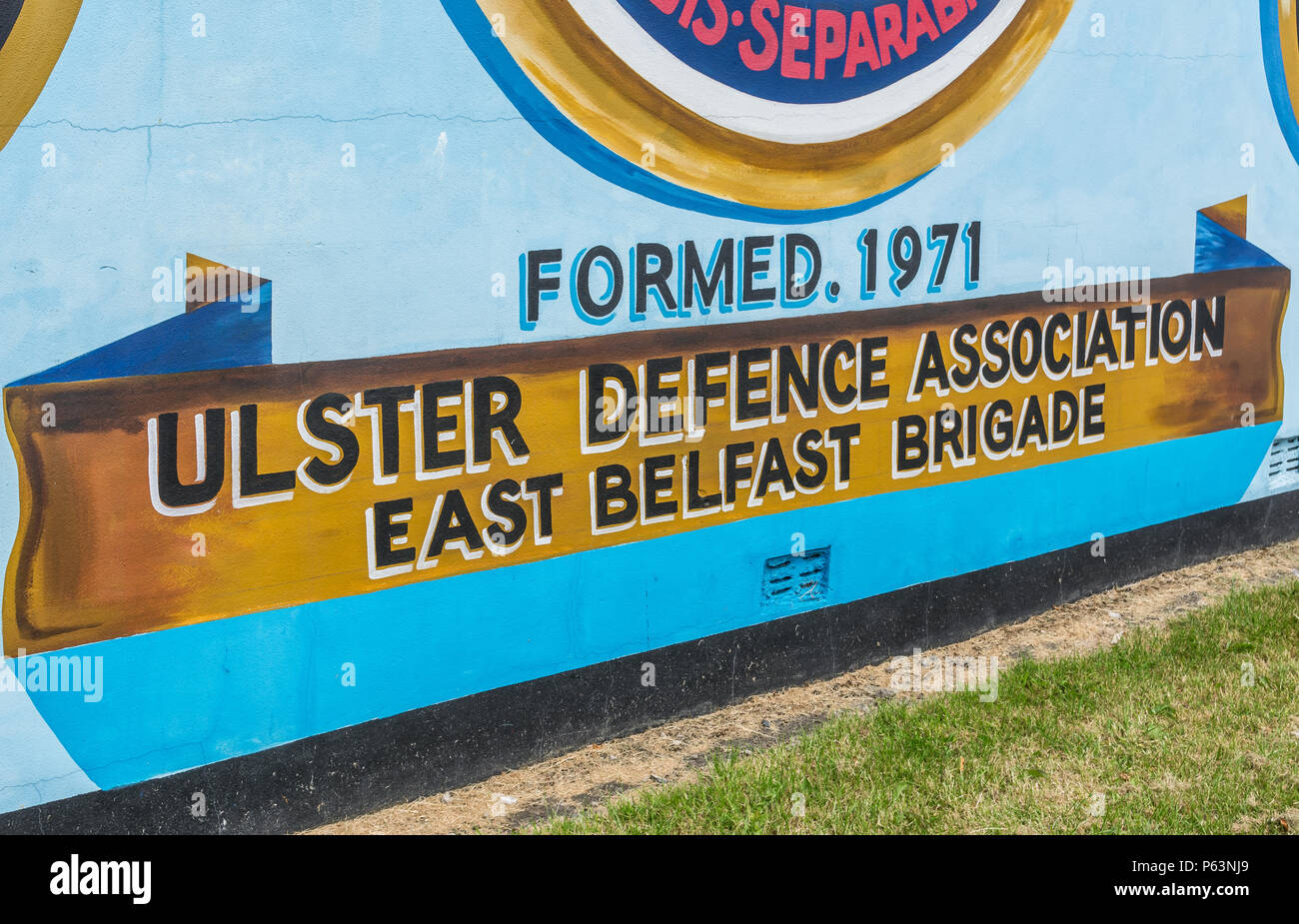Close up di Ulster Defence murale di associazione alla libertà angolo, Newtownards Road nella zona est di Belfast. Foto Stock