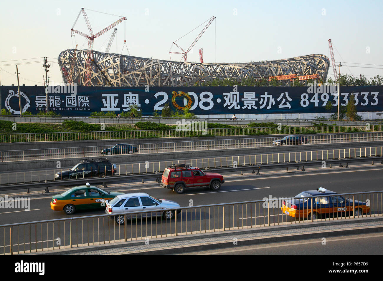 Stadio Nazionale di Pechino in costruzione. Stadio Nazionale di Pechino, noto anche come il nido sarà la principale via e field stadium Foto Stock
