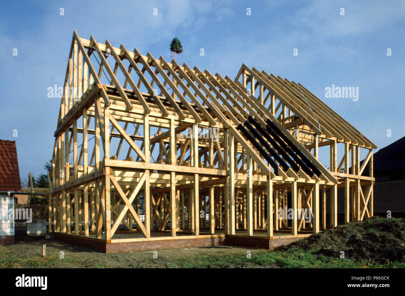 Sito in costruzione di legno e di quadro della sola casa famiglia Foto Stock