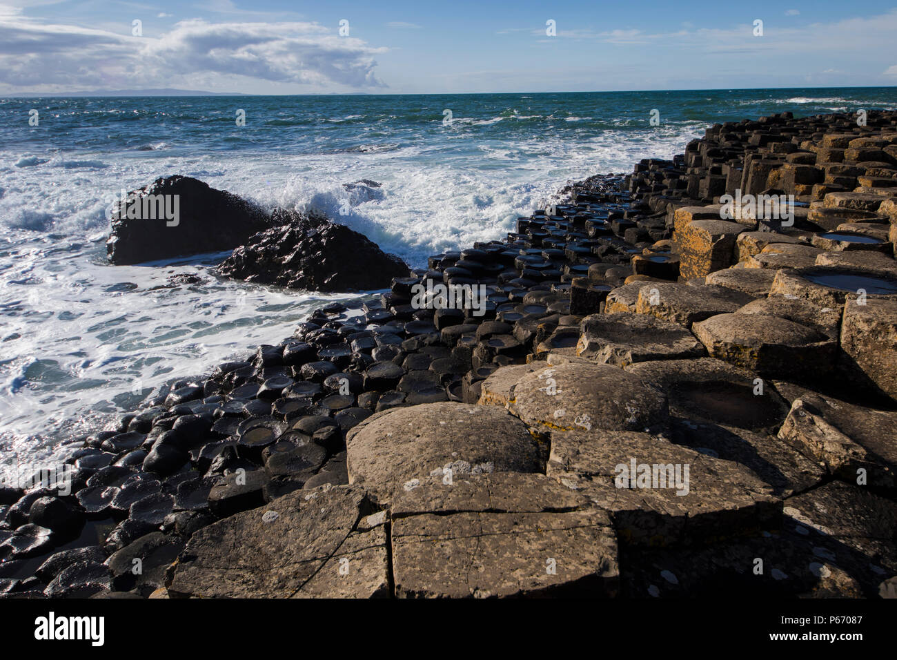 Giants Causway al tramonto Foto Stock