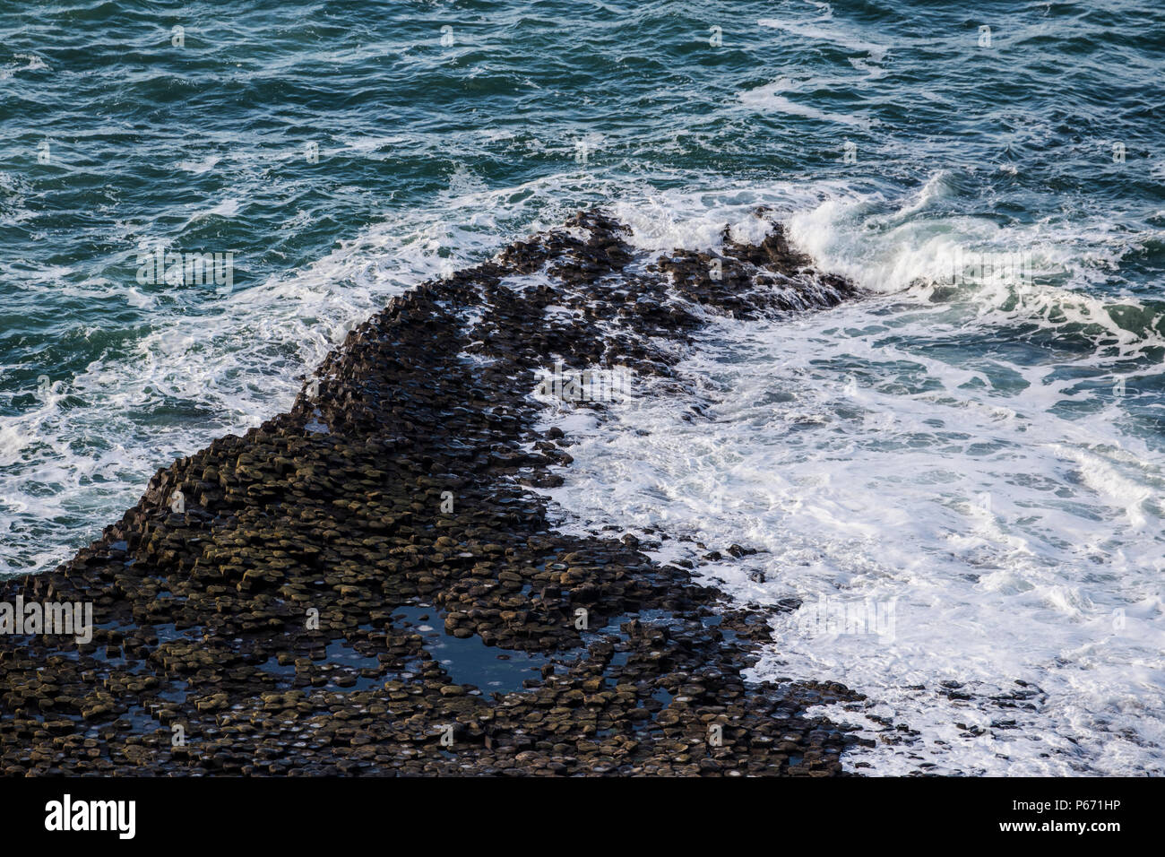 Giants Causway al tramonto Foto Stock