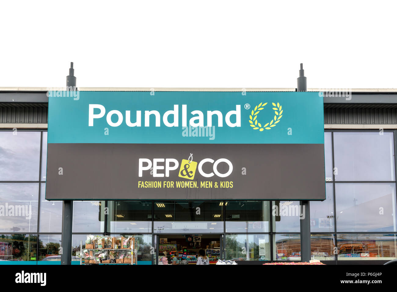 Segno su un Poundland store Foto Stock