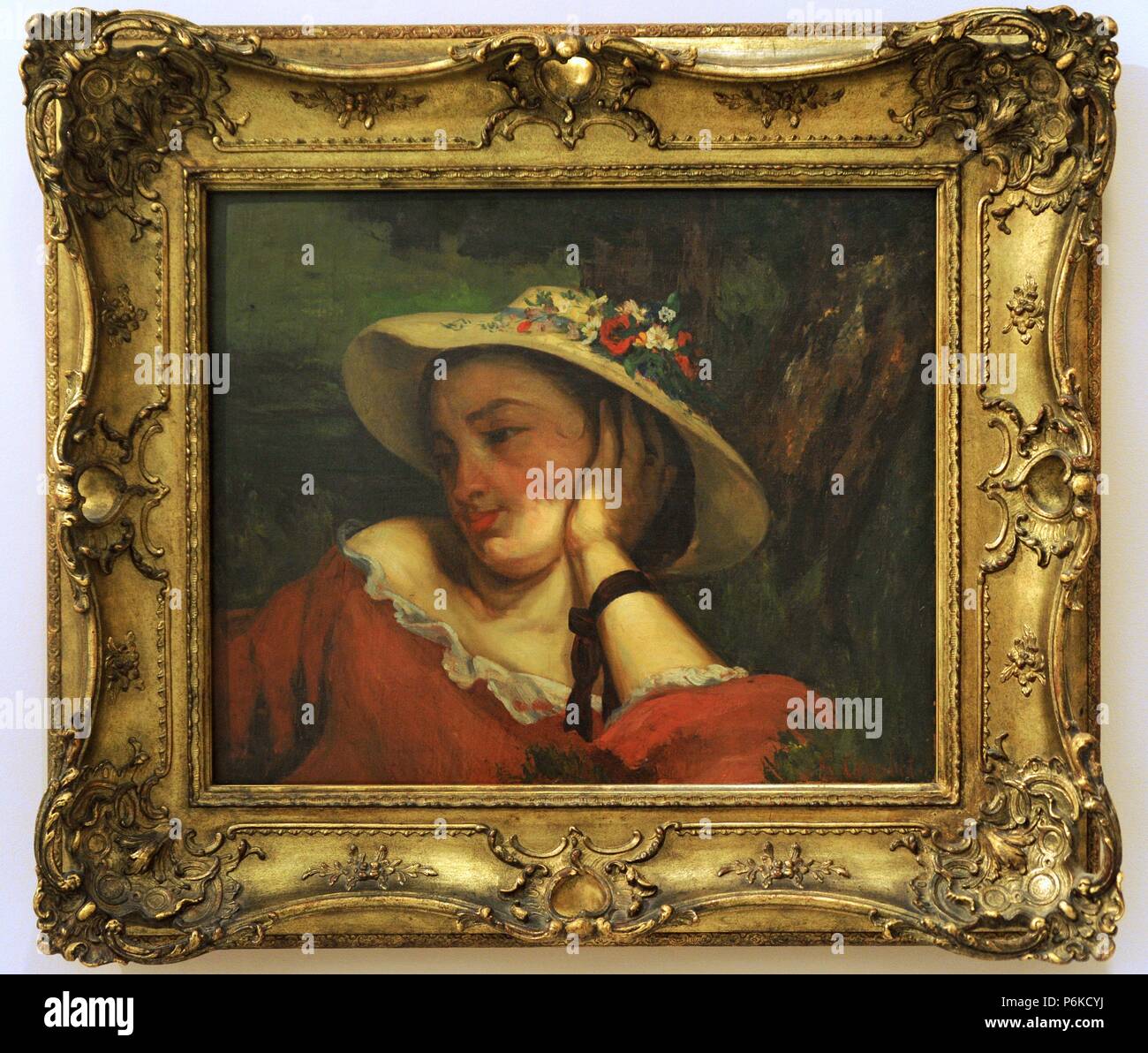 ARTE SIGLO XIX. FRANCIA. Gustave Courbet (1819-1877). Pintor francés, fundador y máximo representante del realismo. 'Mujer con sombrero de Paja con flores', 1857. Galería Nacional de Praga. República Checa. Foto Stock ARTE SIGLO XIX. FRANCIA. Gustave Courbet (1819-1877). Pintor francés, fundador y máximo representante del realismo. 'Mujer con sombrero de Paja con flores', 1857. Galería Nacional de Praga. República Checa. Foto Stock