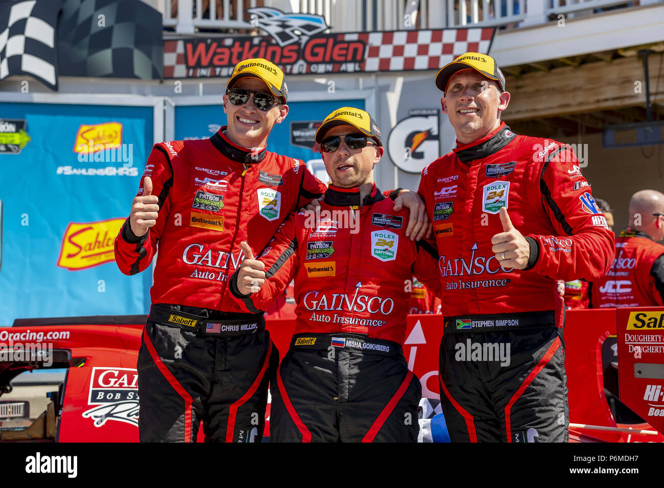 Watkins Glen, New York, Stati Uniti d'America. 1 Luglio, 2018. CHRIS MILLER di Stati Uniti, STEPHEN SIMPSON del Sud Africa e MISHA GOLKBERG del Canada, celebrare dopo aver vinto il Sahlen la sei ore al Glen a Watkins Glen International Raceway in Watkins Glen, New York. Credito: Walter G Arce Sr Asp Inc/ASP/ZUMA filo/Alamy Live News Foto Stock