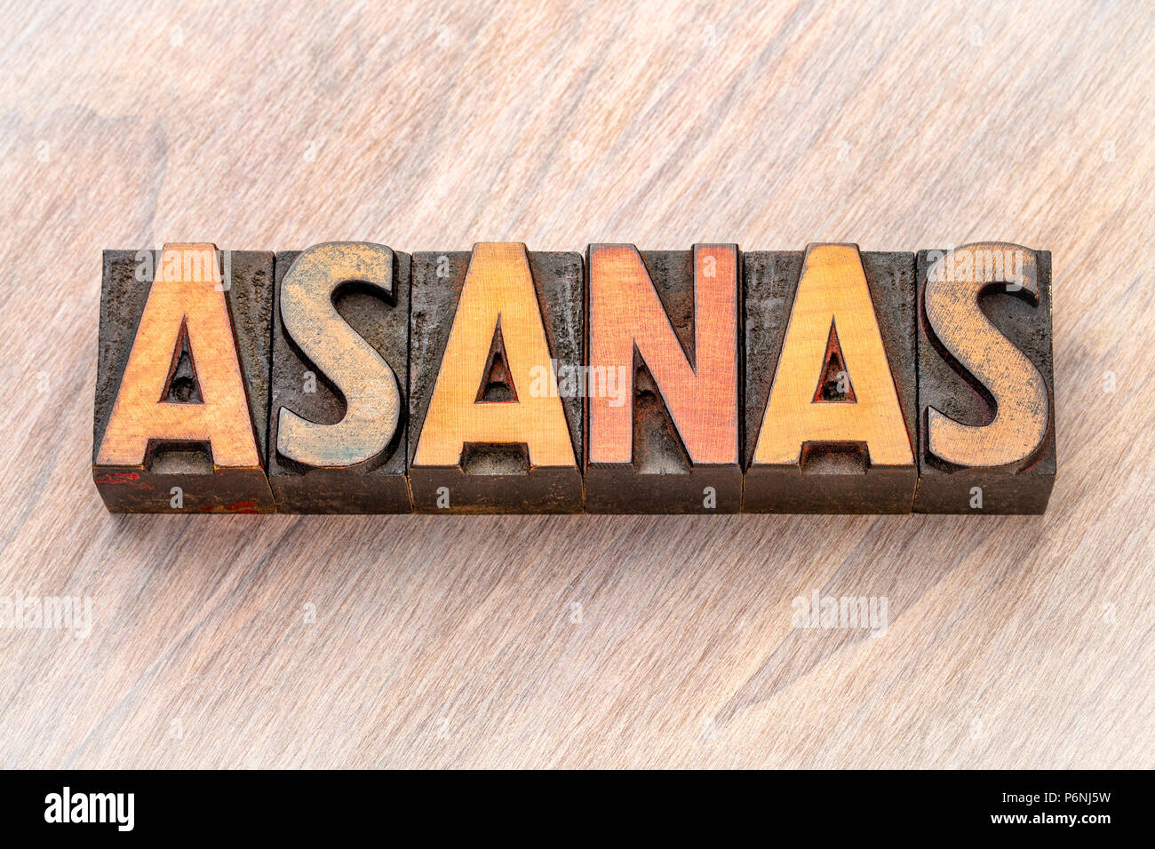 Asana - word abstract in rilievografia vintage tipo legno Foto Stock