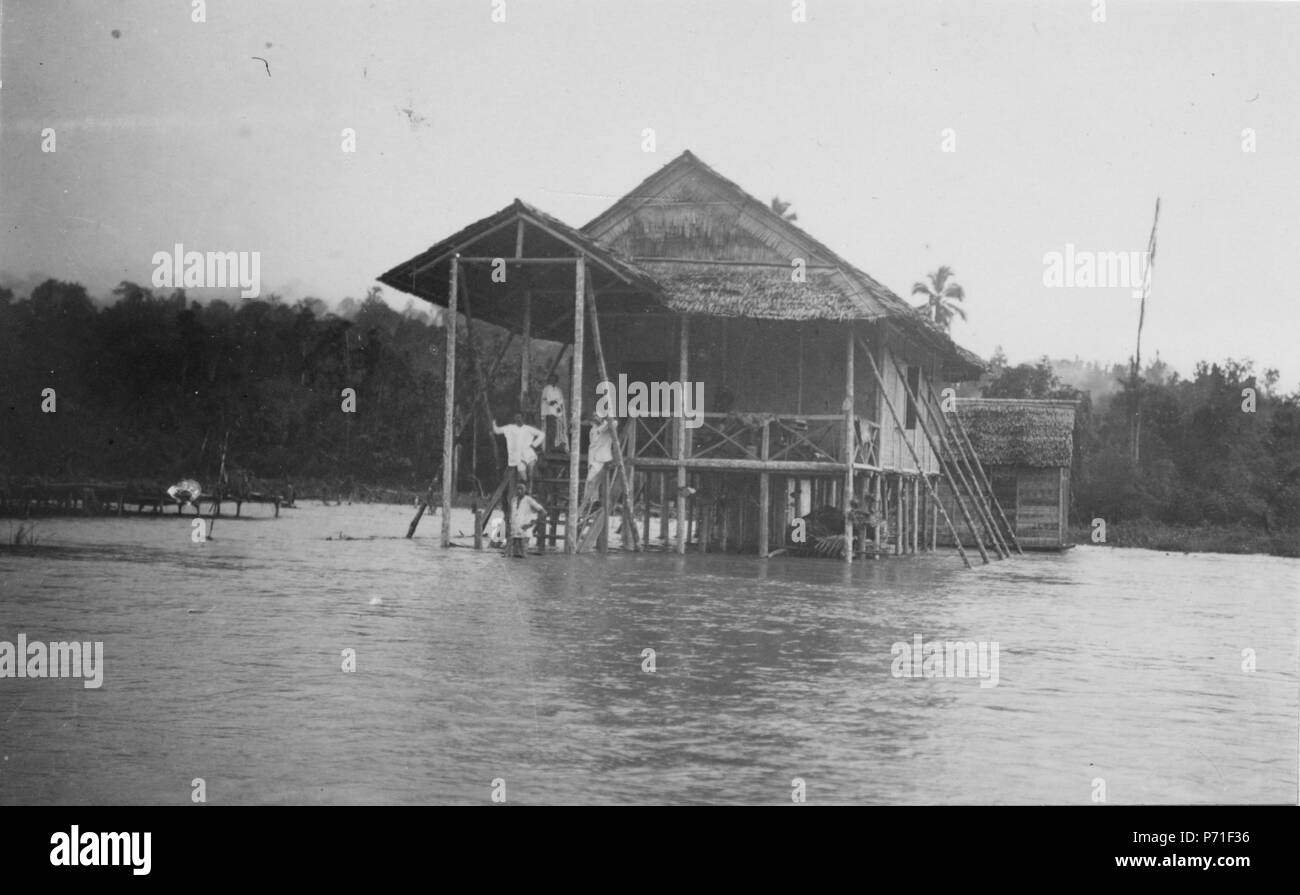 31 Hus på en kokosplantage efter ett häftigt regn - SMVK - 010663B Foto Stock