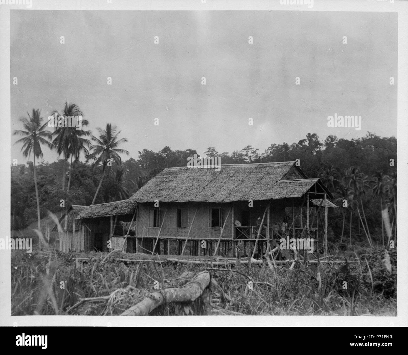 4 Bambuflätat hus Motongkad i. Norra Celebes. Kabupaten Bolaang Mongondow, Sulawesi. Indonesien - SMVK - 000262 Foto Stock