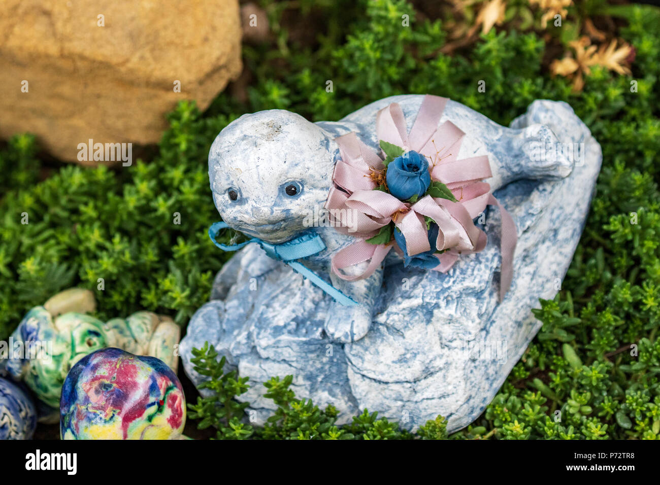 Whimsical giardino decorazione d'Arte - Guarnizione di tenuta Foto Stock