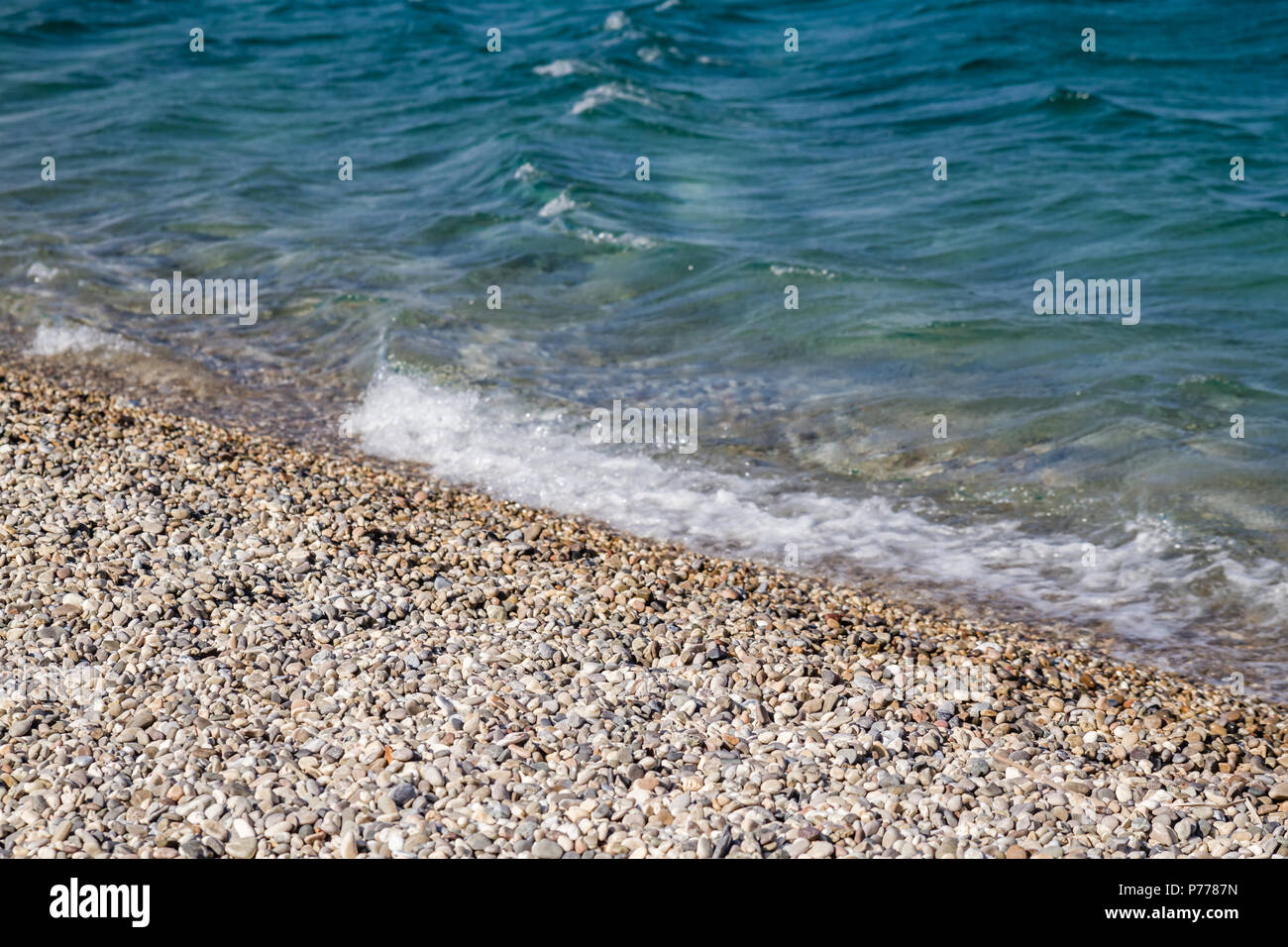 Clwean e chiara spiaggia di Anemurium antica città in Anamur, Turchia Foto Stock