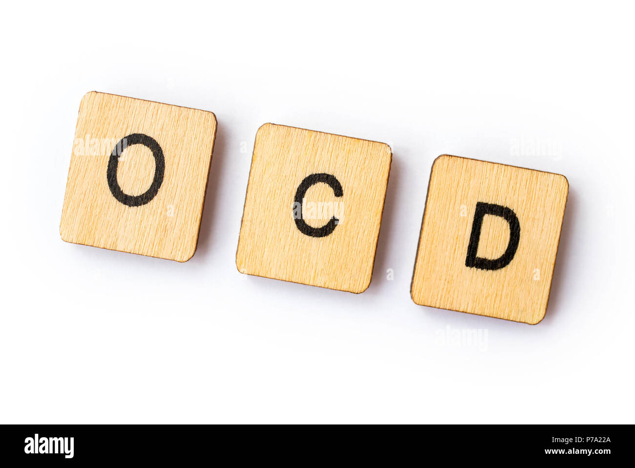 La sigla OCD - Disturbo ossessivo compulsivo - il farro con lettera in legno piastrelle. Foto Stock