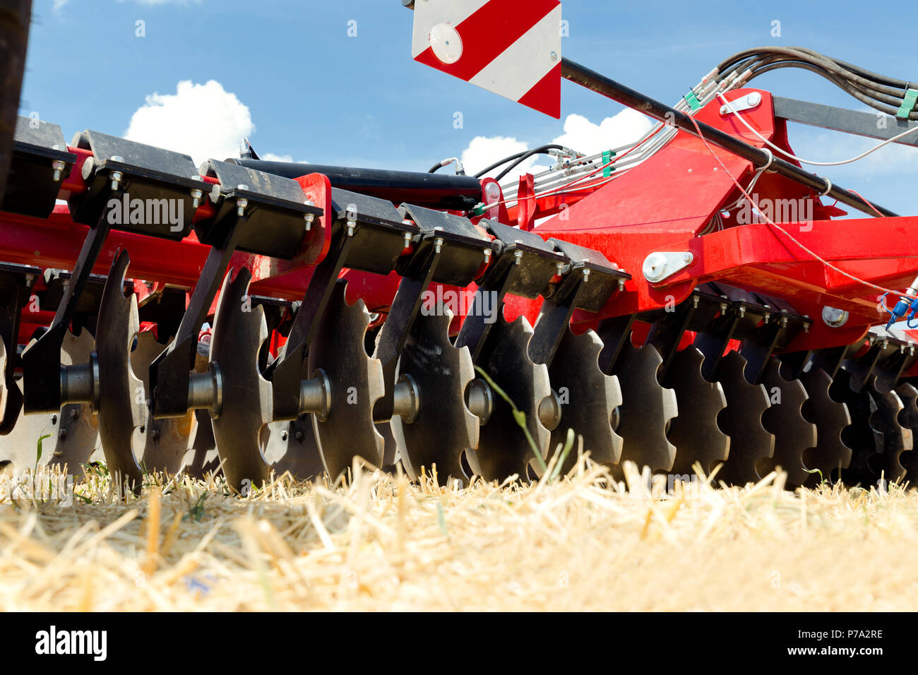 Mietitrebbia testa a pettine. Agricoltura macchine pesanti Foto Stock