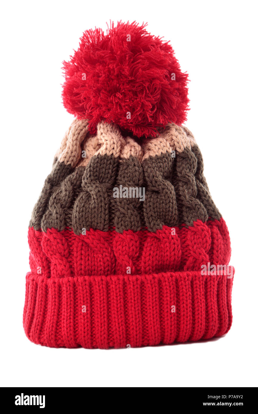 Red striped bobble knit hat o sci hat isolato su uno sfondo bianco. Foto Stock